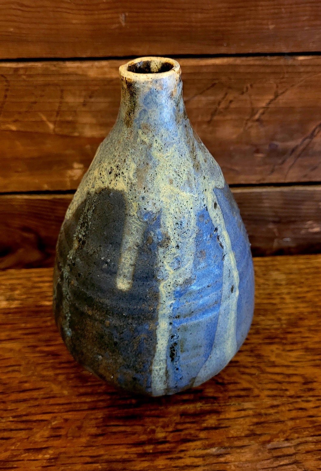 Blue pottery bud vase