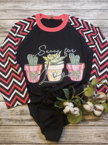 Succa for love chevron print sleeve raglan in pink black and white